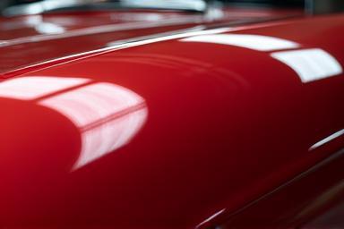 Polished car paint finish close-up